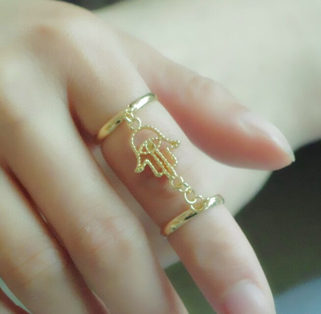 Europe and the United States personality open palm anti-war tassel chain ring   8RD124